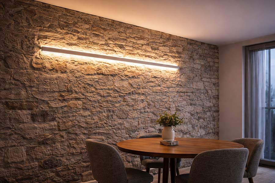 profilé LED indirect sur mur en pierre